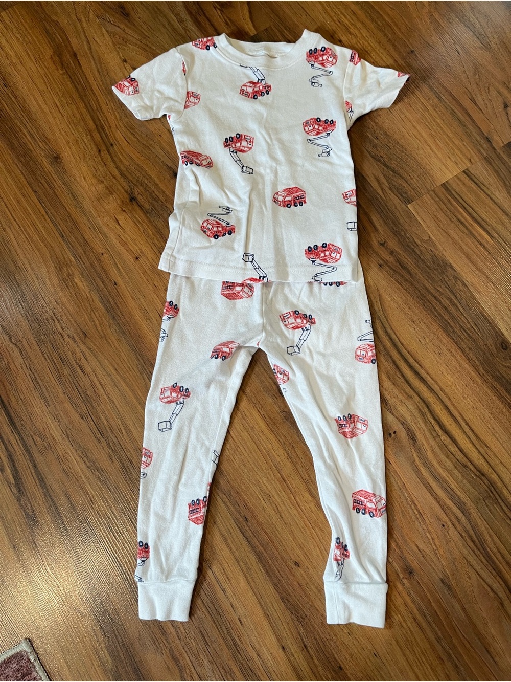 3/$10 Kids White Two-Piece Pajama Set with Distressed Red Fire Truck Print